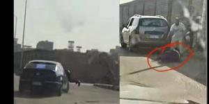 في واقعة سحل فرد مرور بالأوتوستراد، تحديد بيانات السيارة وهوية قائدها