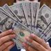الدولار يهبط لأدنى مستوى فى ثلاثة أشهر مع اضطرابات السندات