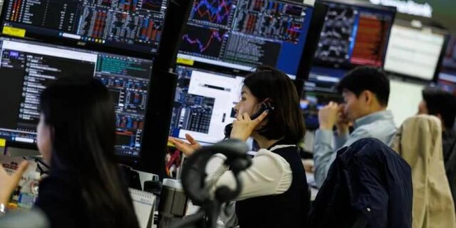 الأسهم الأمريكية تغلق منخفضة بعد قرار تثبيت الفائدة